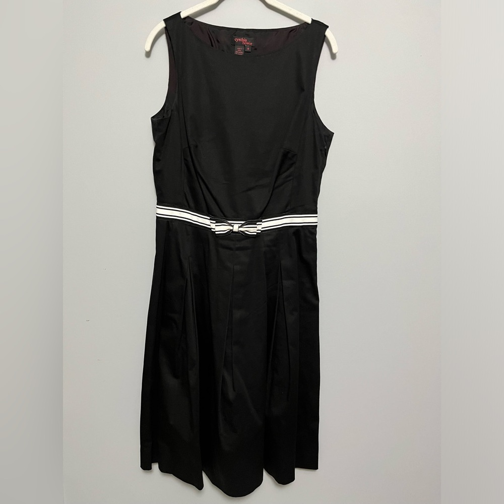 Cynthia Howie black boatneck dress with white grosgrain ribbon around the waist